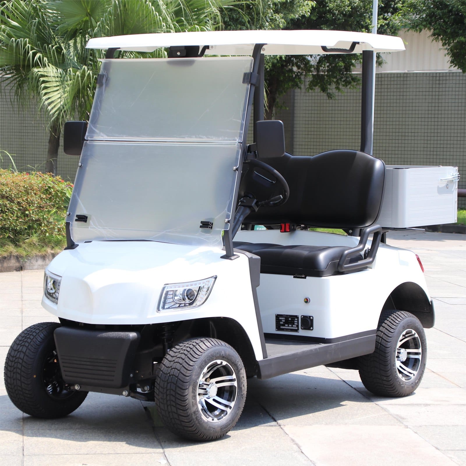2 seater electric golf buggy with a cargo bed