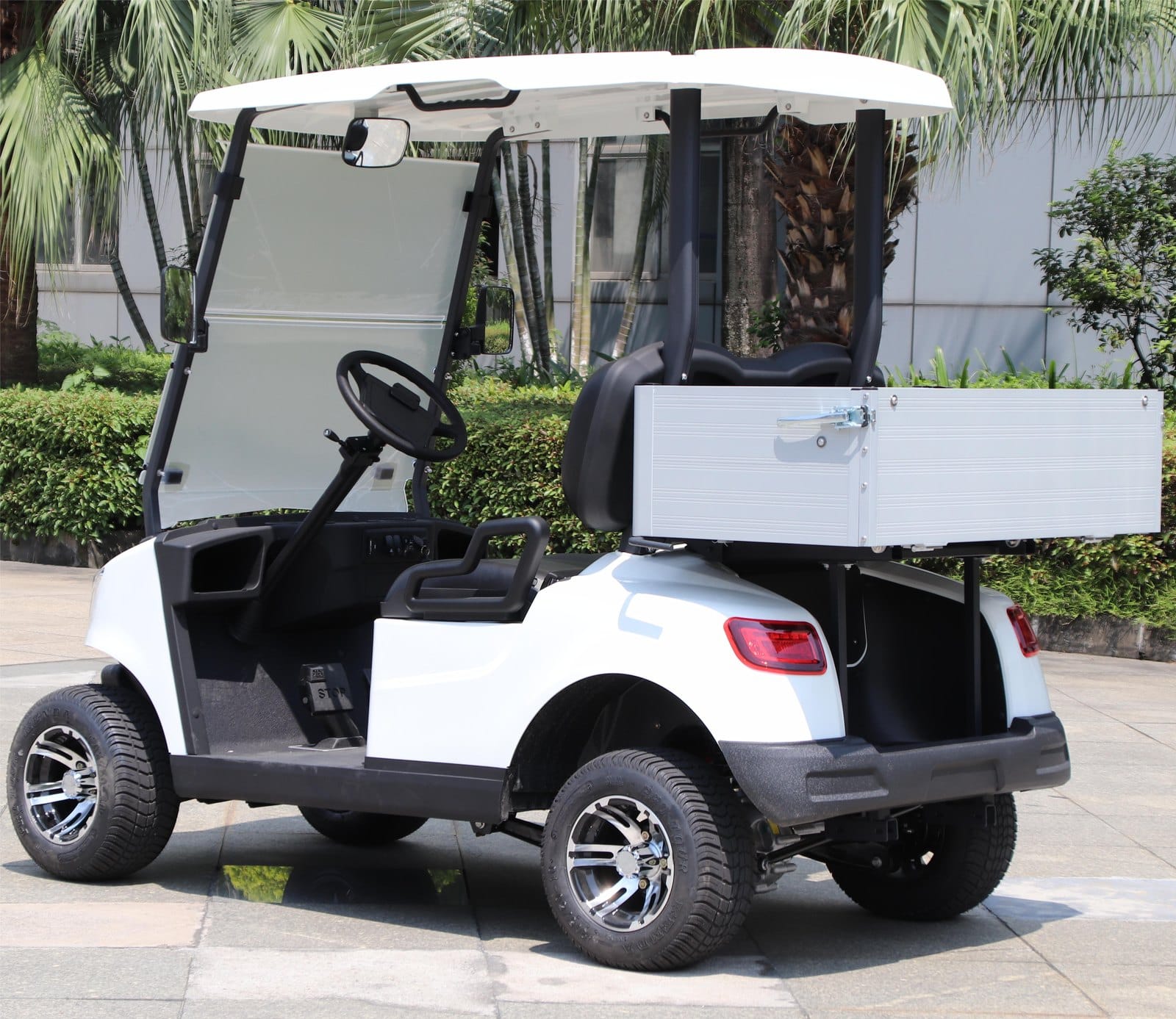 2 seater electric golf buggy with a cargo bed