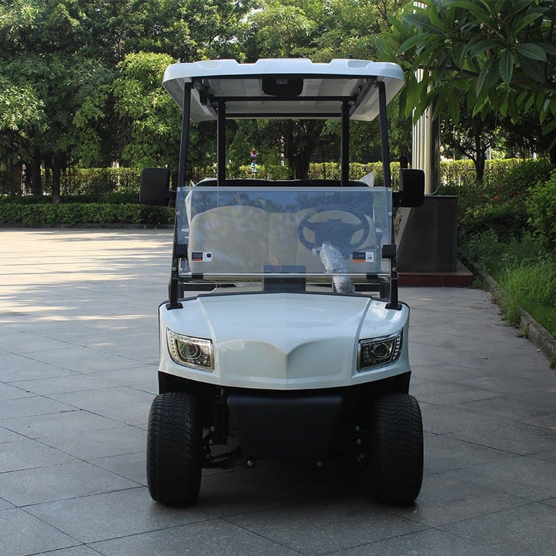 4 seater electric golf buggy with a rear flip seat that folds into a load bed