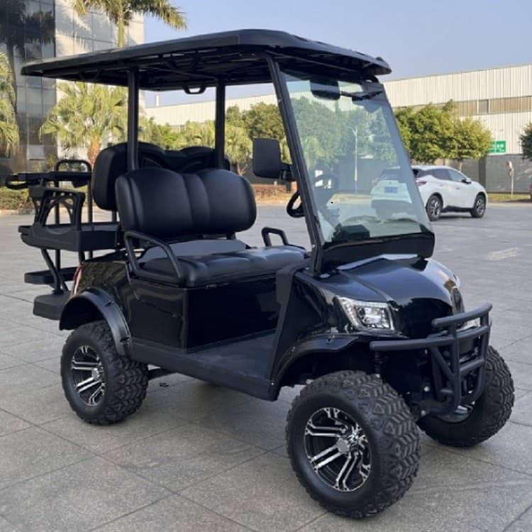 Black lifted 4 seater electric golf buggy on all terrain tyres with a rear flip seat