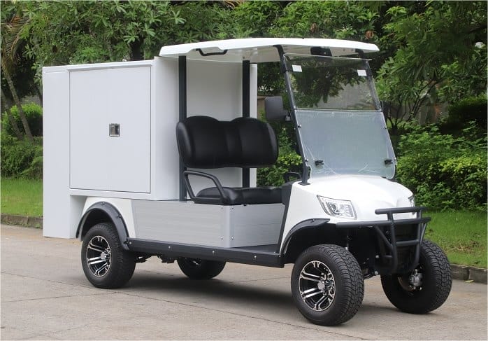 Electric utility vehicle with a housekeeping cabinet body