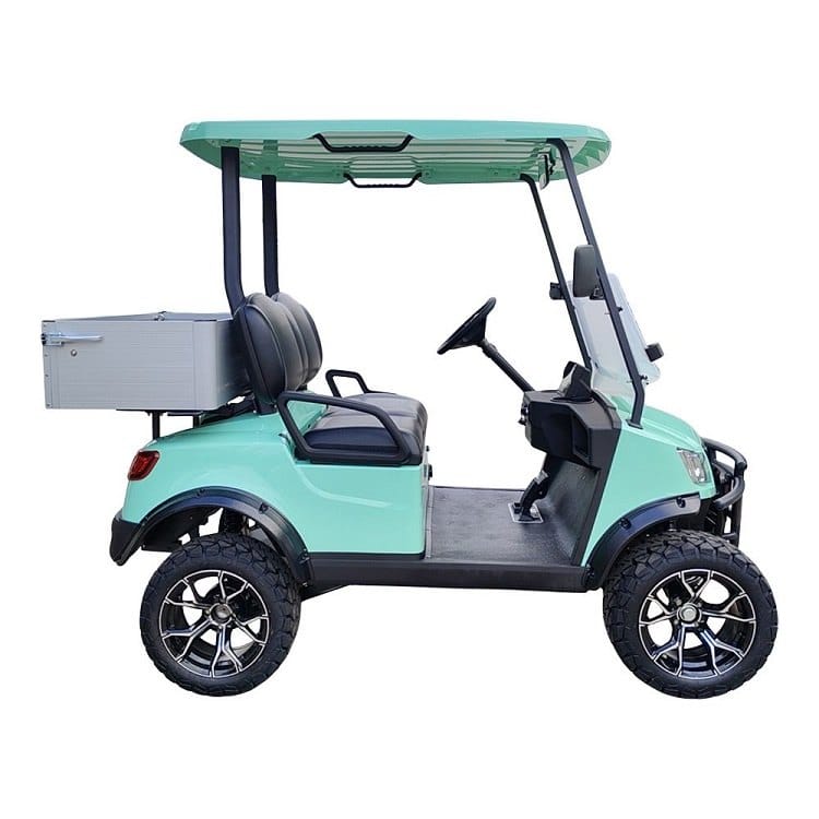 Side view of the mint green lifted 2 seater golf buggy, showing the raised suspension and rear cargo box